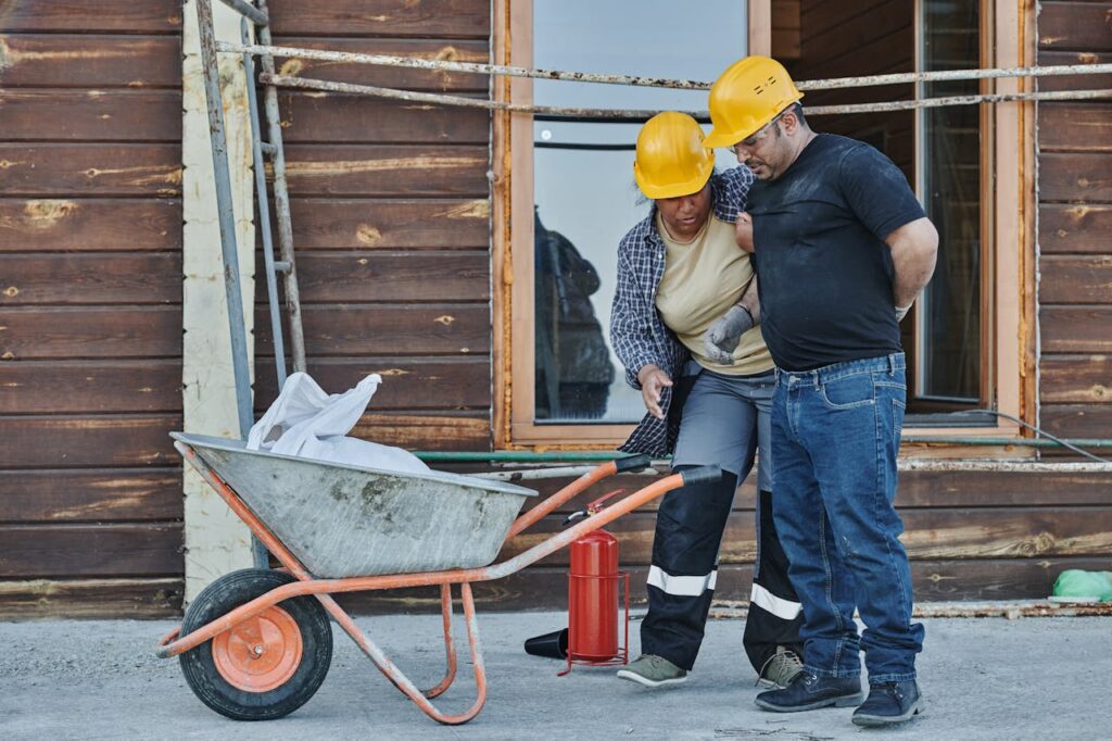 Photo by Mikael Blomkvist: https://www.pexels.com/photo/a-worker-supporting-an-injured-co-worker-8961556/