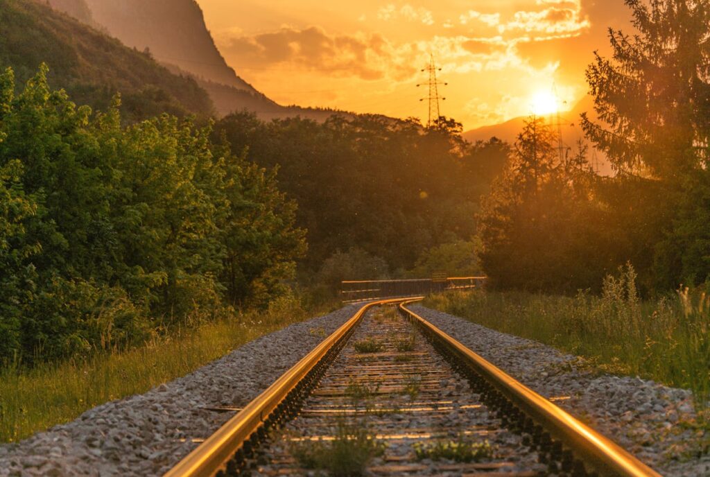 Photo by Krivec Ales: https://www.pexels.com/photo/train-railway-near-trees-552779/