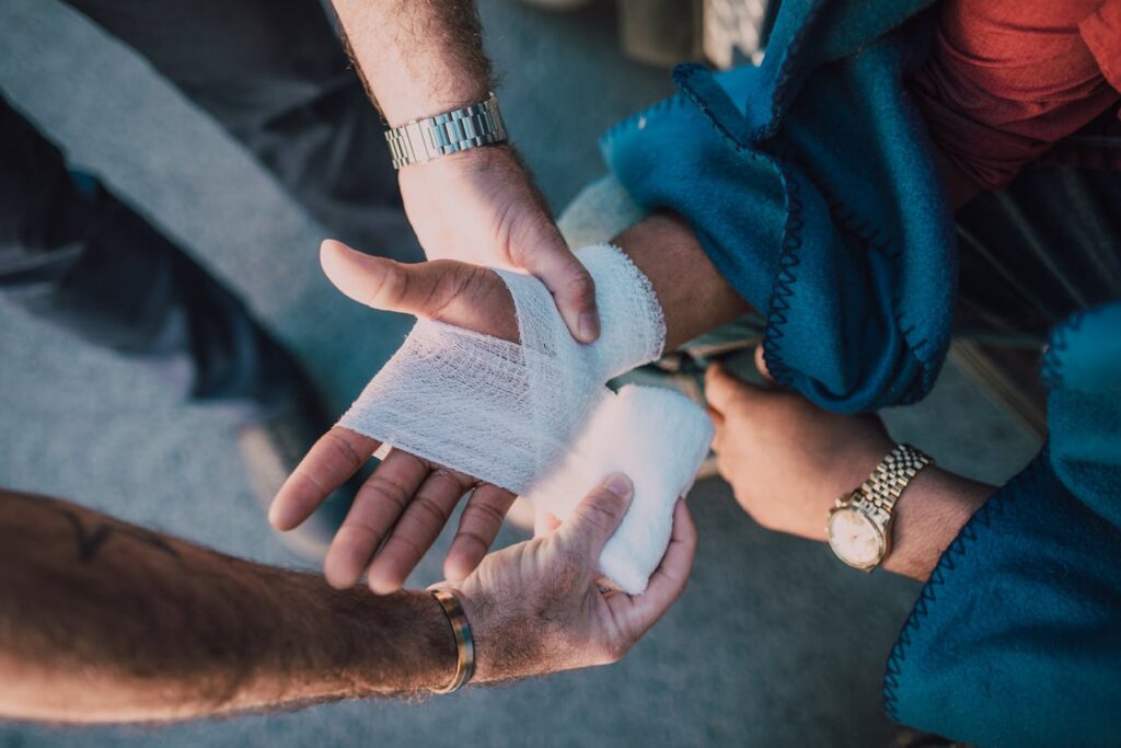 Photo by RDNE Stock project: https://www.pexels.com/photo/person-applying-bandage-on-another-person-s-hand-6519905/
