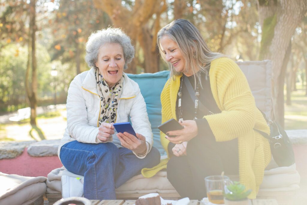 Photo by Kampus Production: https://www.pexels.com/photo/elderly-women-sitting-on-a-couch-while-looking-at-the-screen-of-a-cellphone-6838560/